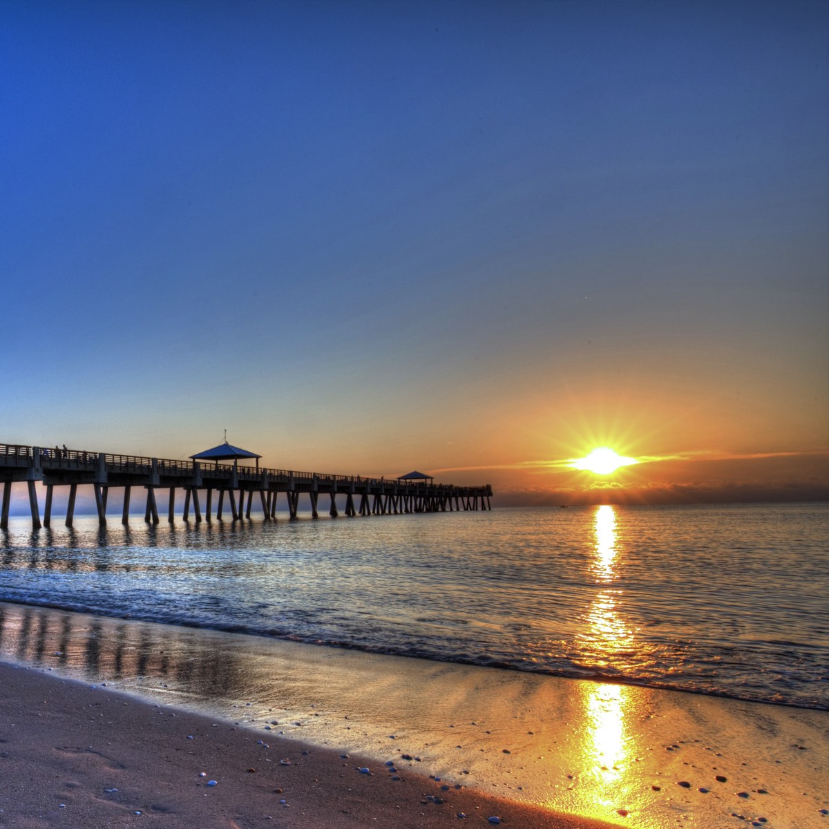 Sunrise beside a Palm Beach County ocean pier